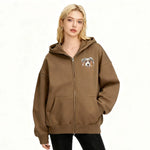 A Zip-up hoodie with embroidered design displayed on a white background.