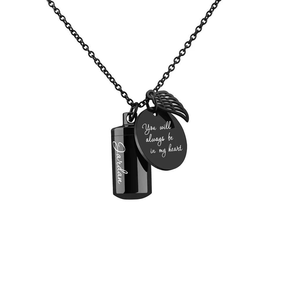 Black necklace with pendant and tag on a white background