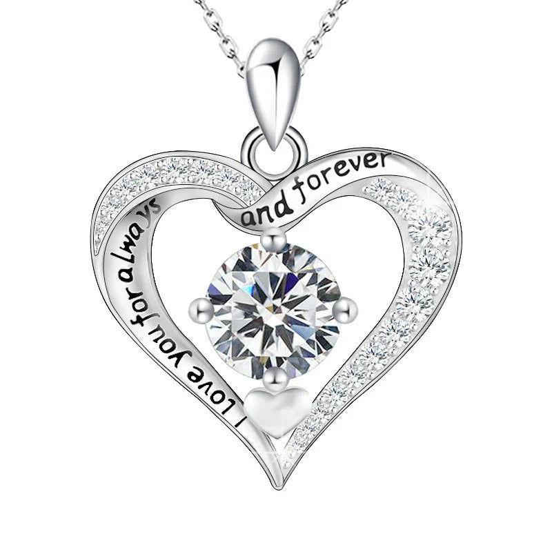 Heart-shaped silver birthstone necklace engraved with “Love you for always and forever,” featuring a central sparkling stone symbolizing eternal love.