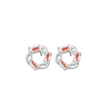 A pair of silver stud earrings designed in a circular wreath shape, featuring multiple marquise-cut zircon stones with a colorful reflective finish for a festive and elegant look.