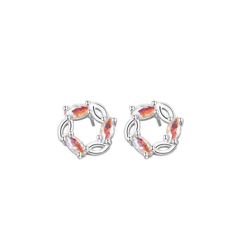 A pair of silver stud earrings designed in a circular wreath shape, featuring multiple marquise-cut zircon stones with a colorful reflective finish for a festive and elegant look.