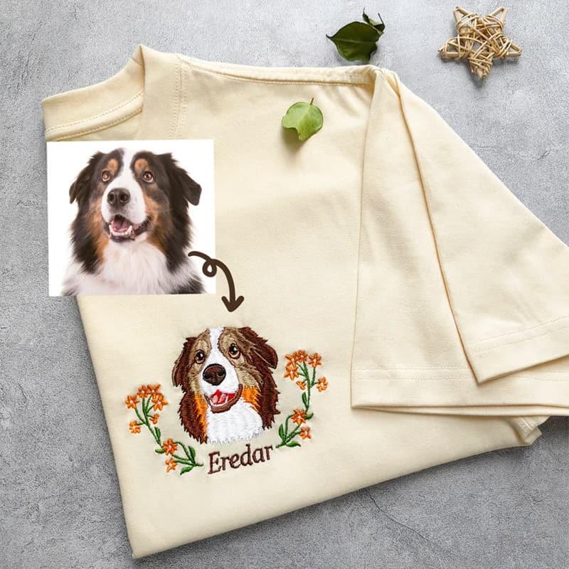 T-shirt featuring an embroidered dog portrait and the name ¡°Amanda¡± stitched on the sleeve.
