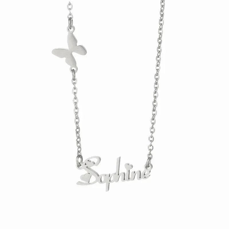 A silver personalized name necklace featuring the name “Sophine” in elegant script with small heart accents on the letters, complemented by a delicate butterfly charm on the chain.