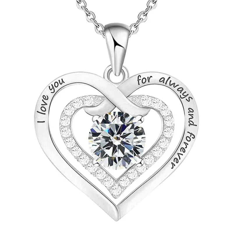 Heart-shaped silver pendant with 'I love you' and 'for always and forever' inscriptions on a white background.