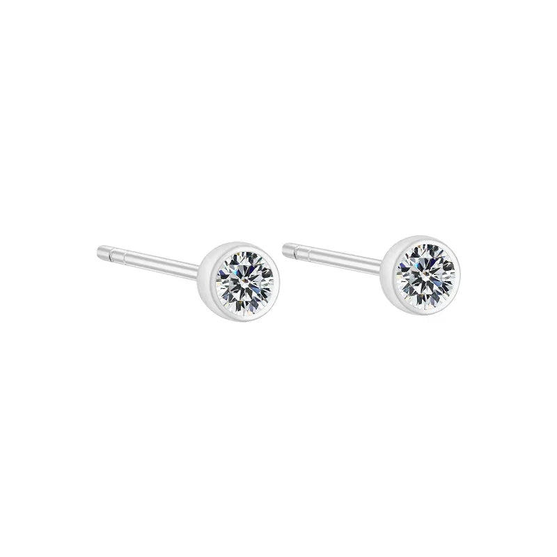 Pair of silver stud earrings with clear gemstones on a white background