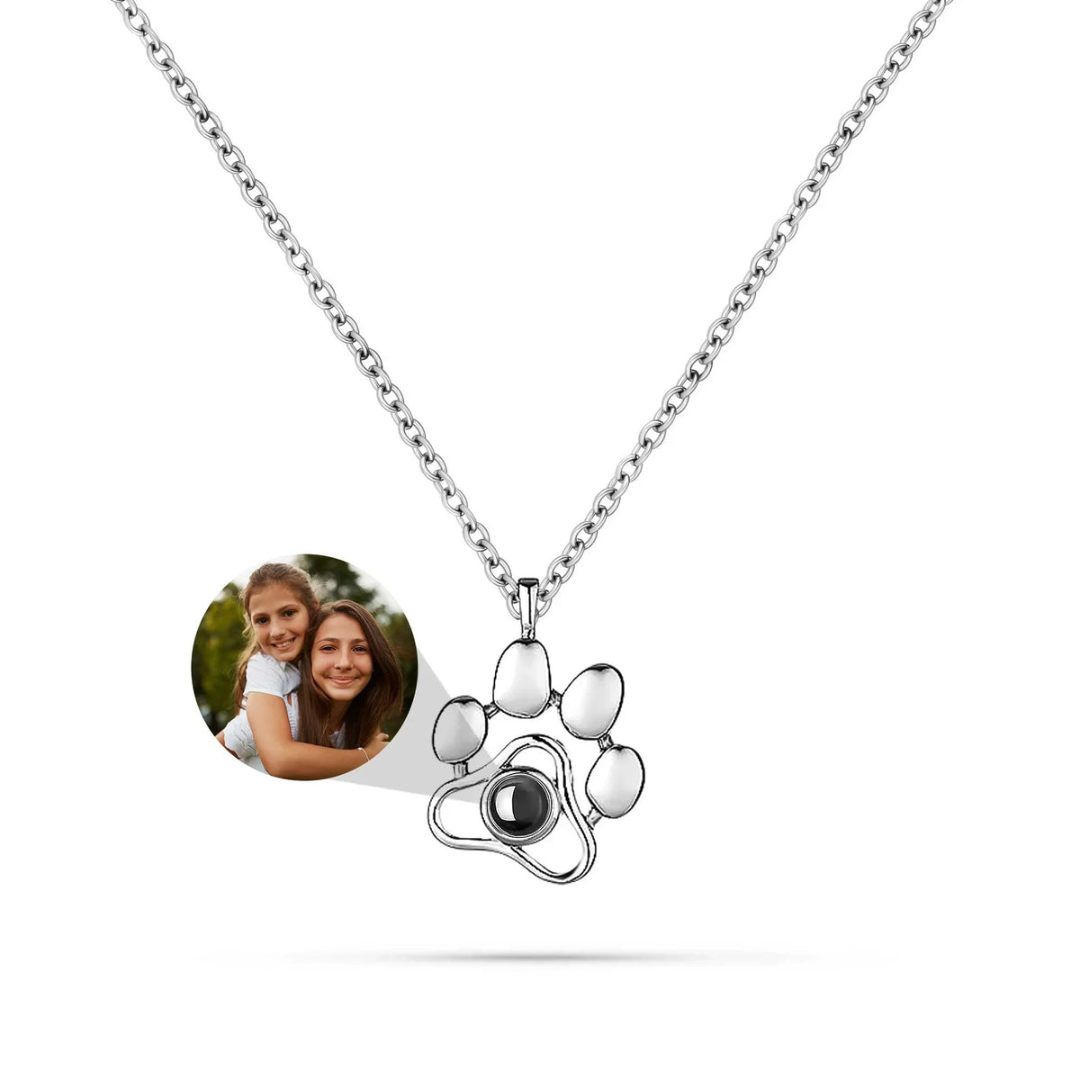 Necklace with a paw-shaped pendant and photo frame on a white background