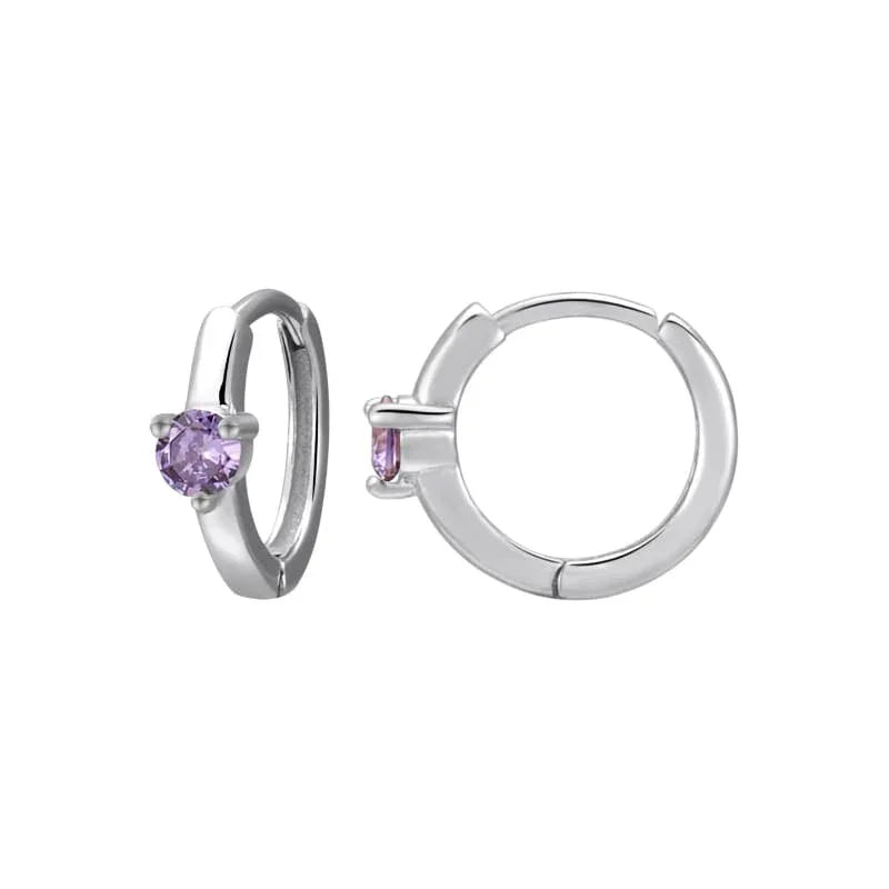Silver hoop earrings with purple gemstones on a white background