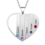 Silver heart-shaped necklace engraved with five names and adorned with five colorful birthstones, symbolizing family love and connection.