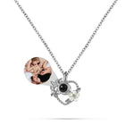 Heart-shaped necklace with a photo pendant on a white background