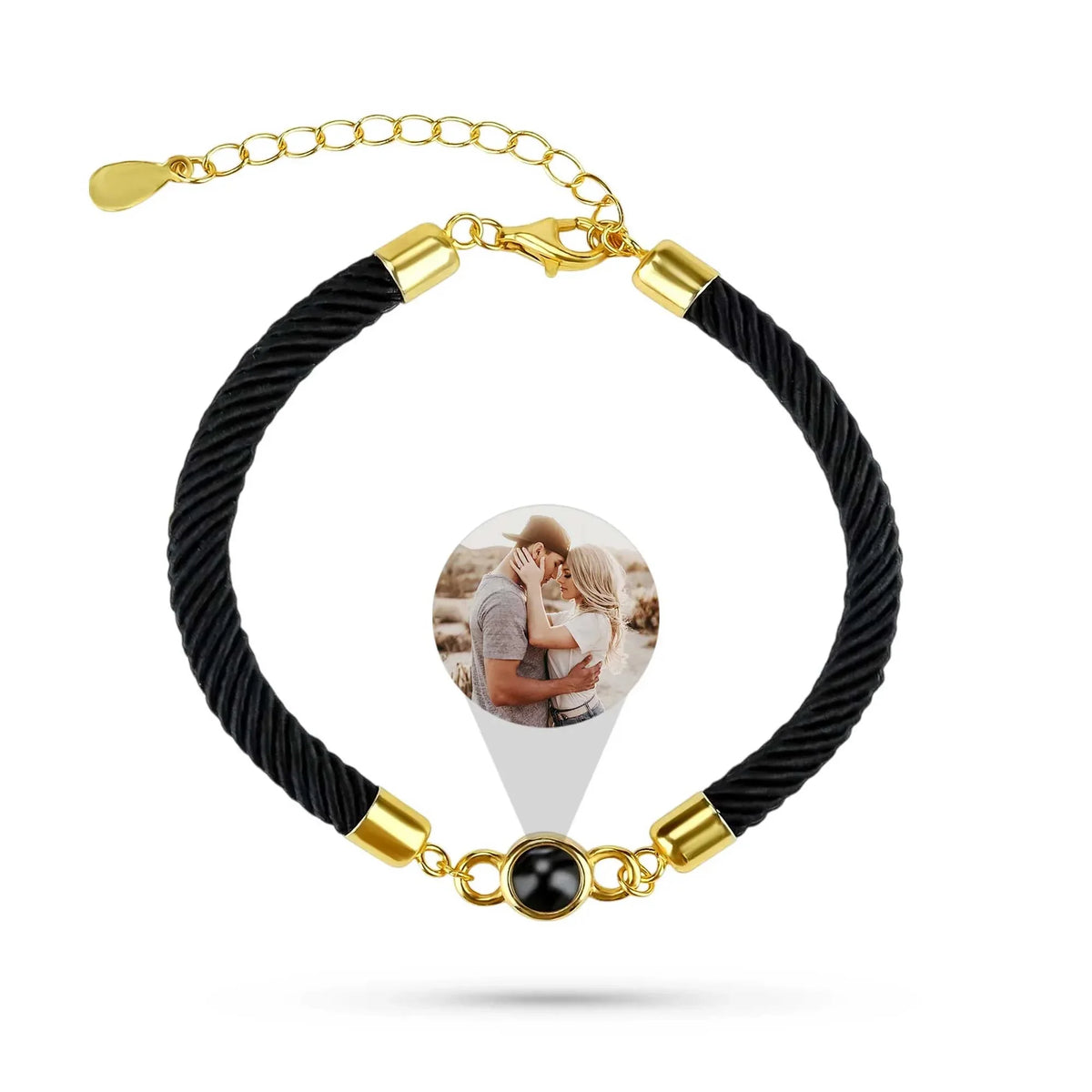 Black braided bracelet with gold accents and a heart-shaped photo charm on a white background