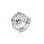 Silver multi-band ring with colorful birthstones and engraved names.