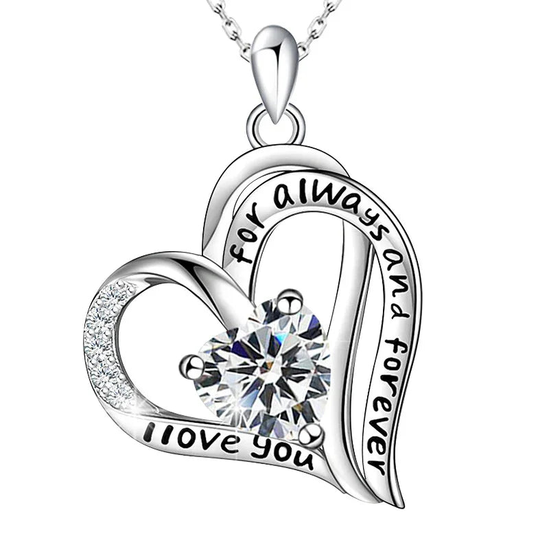 Sterling silver double-heart pendant engraved with “I love you for always and forever,” featuring a sparkling heart-shaped birthstone.