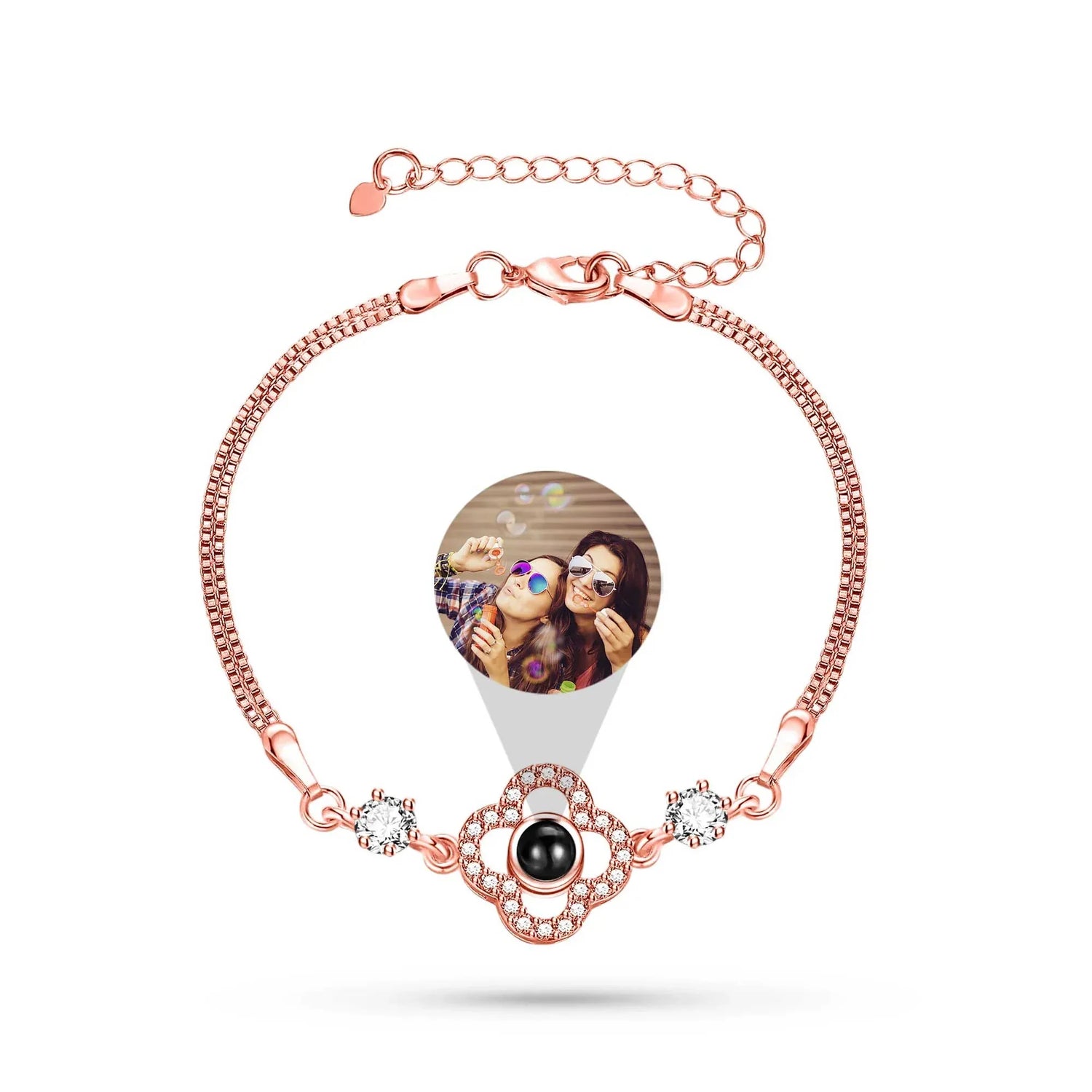 Rose gold bracelet with a photo charm on a white background