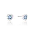 Heart-shaped earrings with blue gemstones on a white background