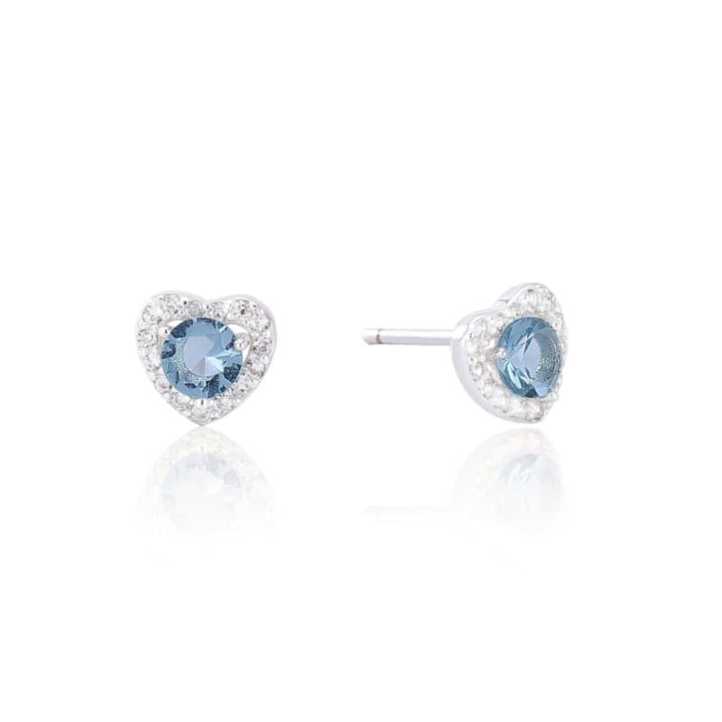 Heart-shaped earrings with blue gemstones on a white background
