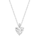 Heart-shaped diamond pendant on a chain against a white background
