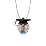 Heart-shaped photo locket with graduation cap design on a white background