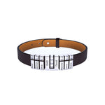 A men’s bracelet with a dark brown leather strap and multiple shiny silver rectangular nameplate beads. The central bead is slightly larger with decorative crystal-like accents, while the surrounding beads are sleek and evenly spaced along the strap. The bracelet has an adjustable buckle closure for a secure fit.