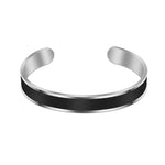 A sleek open cuff bracelet with a polished silver-tone finish and a textured black inlay, designed with a minimalist modern style. The open design allows for an adjustable and comfortable fit.