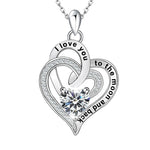 Silver heart-shaped pendant with 'I love you to the moon and back' text on a white background