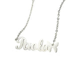 A personalized silver necklace featuring the name “Paola” in smooth cursive font, accented with a small butterfly charm at the end of the name, attached to a delicate chain.