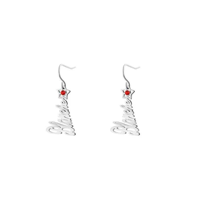 A pair of personalized dangle earrings featuring the name “Blanche” in elegant script, each topped with a star-shaped charm accented by a small red birthstone.