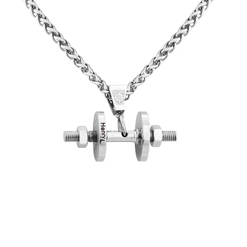 A stainless steel men’s necklace featuring a dumbbell-shaped pendant engraved with the name “Henry,” symbolizing strength, fitness, and personalized style.