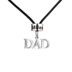 A men’s necklace with a black cord featuring a silver bead engraved with the name “Miles” and a hanging “DAD” pendant.