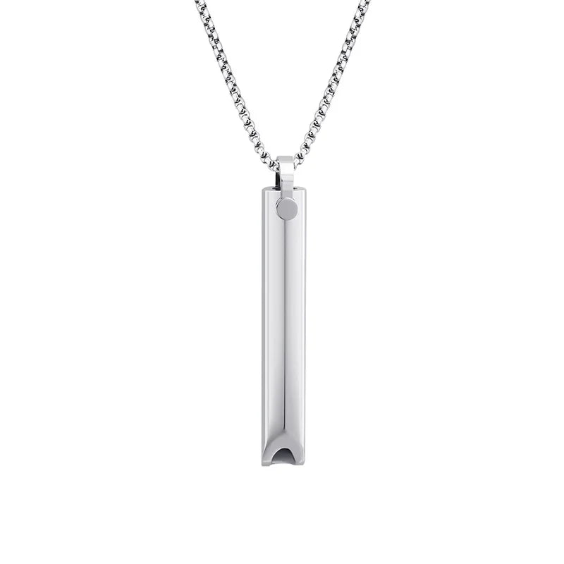 A sleek stainless steel necklace featuring a polished whistle-shaped pendant with a minimalist design, hanging from a fine chain, symbolizing modern style and personalization.