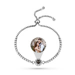 Bracelet with a photo charm featuring a couple on a white background