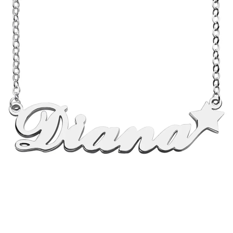 A silver necklace featuring the name "Diana" in elegant cursive script, with a small star charm attached to the end of the name. 