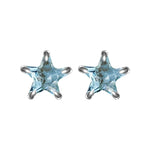 Star-shaped blue gemstone earrings on a white background