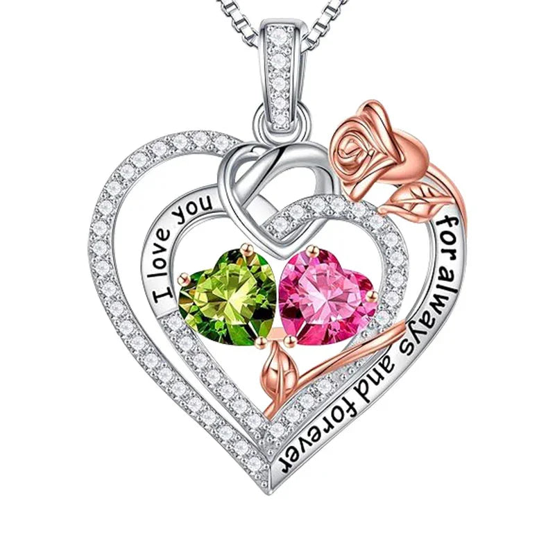 Timeless Bond Birthstone Necklace by Furmino with double-heart design, rose detail, and two radiant heart-shaped birthstones.