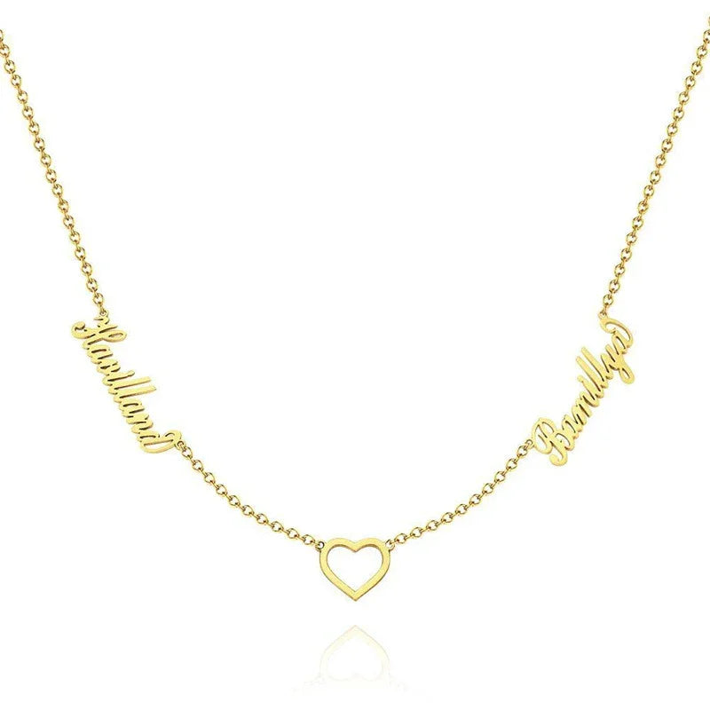 Gold necklace with heart design on a white background