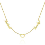 Gold necklace with heart design on a white background