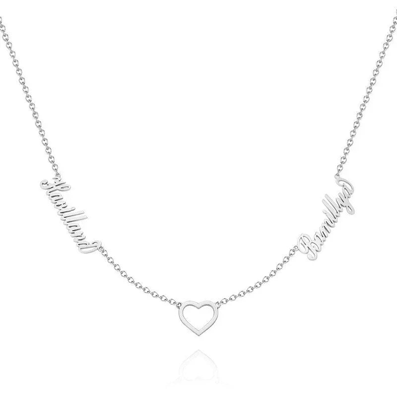 A silver necklace featuring two custom name pendants, “Havilland” and “Branlliya,” connected by an open heart charm in the center, symbolizing love and connection.